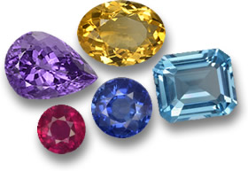 Algumas das gemas coloridas mais populares: safira azul, rubi, topázio, citrino e ametista