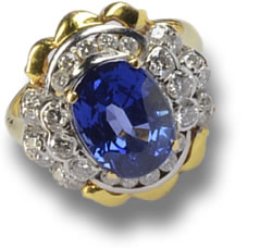 Anel de ouro cravejado com safira azul do Ceilão e diamante