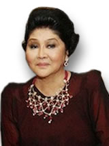 Imelda Marcos Looking Imeldific in Ruby Jewelry