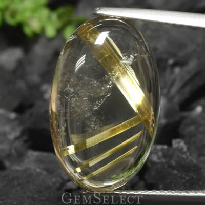 Cabochão de quartzo rutilo com fitas de rutilo dourado