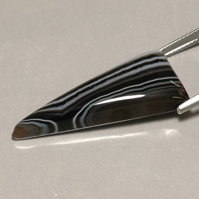 Ágata multicolorido natural 16,75ct, trillion, opaco