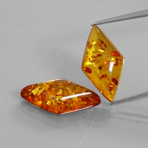 Pedras preciosas de âmbar laranja natural de  ct, forma extravagante, transparente