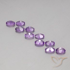 Pedras preciosas de Ametista Violeta arroxeado médio-escuro natural de 3.89 ct, oval, VVS-VS