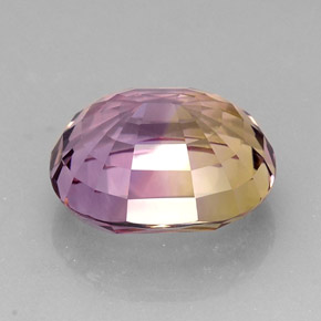 Ametrino bicolor natural 21,12ct, corte oval, VVS