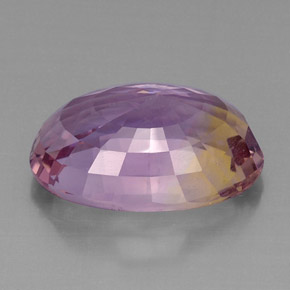 Ametrino bicolor natural 19,14ct, corte oval, VVS