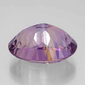 Ametrino bicolor natural 10,85ct, corte oval, VVS