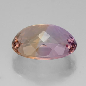 Ametrino bicolor natural 6,74ct, corte oval, VVS