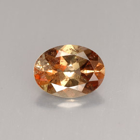 Andaluzita multicolorido natural 1,17ct, corte oval, VS-SI