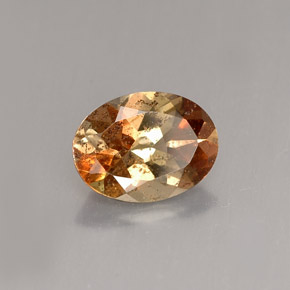 Andaluzita multicolorido natural 1,17ct, corte oval, VS-SI