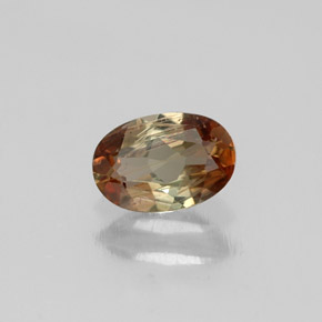 Andaluzita multicolorido natural 0,40ct, corte oval, VS-SI
