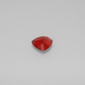 Andesina labradorita vermelho natural 0,81ct, trillion, VS-SI