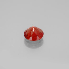 Andesina labradorita laranja natural 0,65ct, corte redondo, VS
