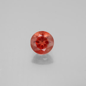 Andesina labradorita laranja natural 0,65ct, corte redondo, VS