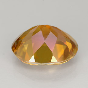 Topázio azotic multicolorido natural 5,63ct, corte oval, VS