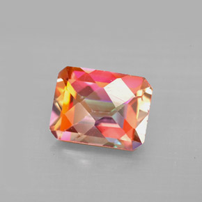 Topázio azotic multicolorido natural 2,56ct, corte esmeralda, VS