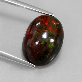 Opala negra multicolorido natural 4,33ct, corte oval, opaco
