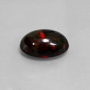 Opala negra multicolorido natural 5,05ct, corte oval, opaco