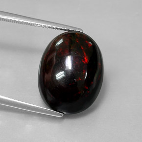 Opala negra multicolorido natural 8,82ct, corte oval, opaco