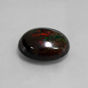 Opala negra multicolorido natural 8,82ct, corte oval, opaco