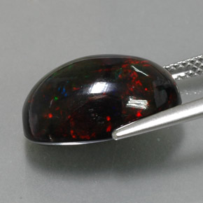 Opala negra multicolorido natural 5,81ct, corte oval, opaco