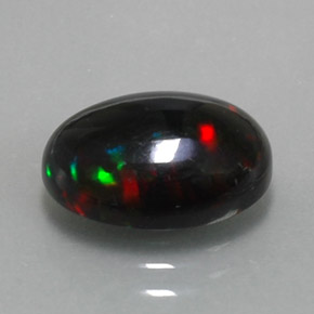 Opala negra multicolorido natural 2,83ct, corte oval, opaco