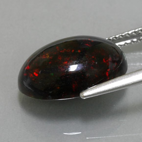 Opala negra multicolorido natural 3,63ct, corte oval, opaco