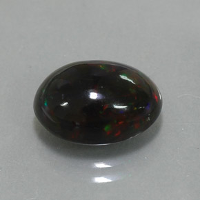 Opala negra multicolorido natural 2,73ct, corte oval, opaco
