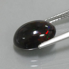 Opala negra multicolorido natural 2,73ct, corte oval, opaco