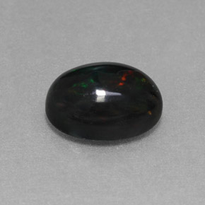 Opala negra multicolorido natural 1,27ct, corte oval, opaco