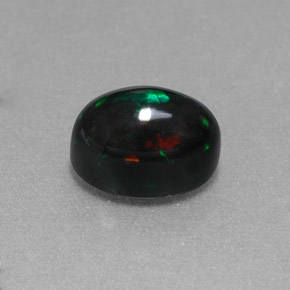 Opala negra multicolorido natural 1,38ct, corte oval, opaco
