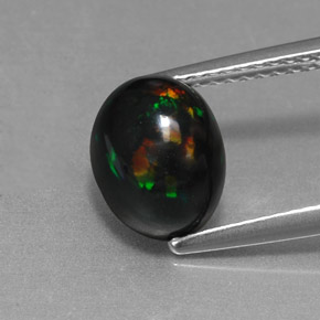 Opala negra multicolorido natural 1,58ct, corte oval, opaco