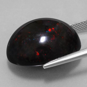 Opala negra multicolorido natural 20,04ct, corte oval, opaco
