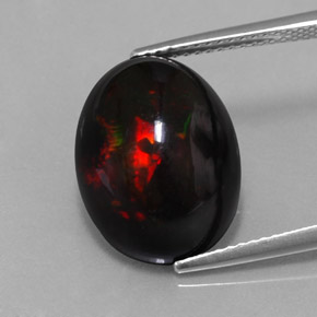 Opala negra multicolorido natural 8,11ct, corte oval, opaco