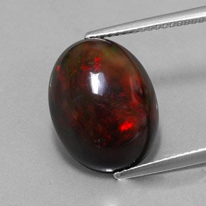 Opala negra multicolorido natural 6,26ct, corte oval, opaco