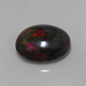 Opala negra multicolorido natural 5,81ct, corte oval, opaco