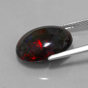 Opala negra multicolorido natural 5,81ct, corte oval, opaco