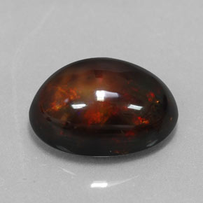Opala negra multicolorido natural 6,02ct, corte oval, opaco