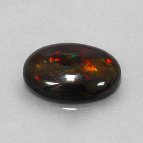 Opala negra multicolorido natural 3,17ct, corte oval, opaco