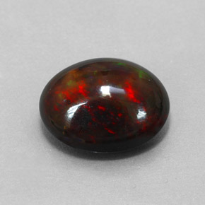 Opala negra multicolorido natural 4,31ct, corte oval, opaco