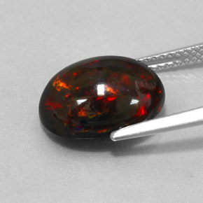 Opala negra multicolorido natural 3,73ct, corte oval, opaco
