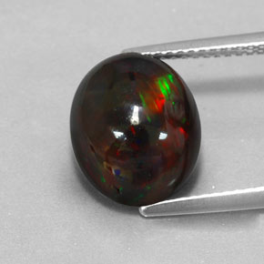 Opala negra multicolorido natural 3,84ct, corte oval, opaco