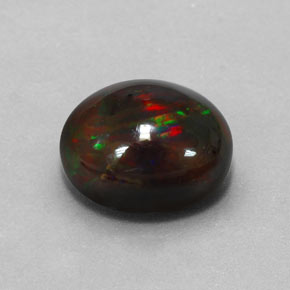 Opala negra multicolorido natural 3,84ct, corte oval, opaco