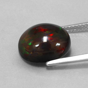 Opala negra multicolorido natural 3,84ct, corte oval, opaco