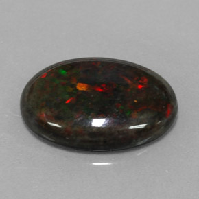 Opala negra multicolorido natural 3,60ct, corte oval, opaco