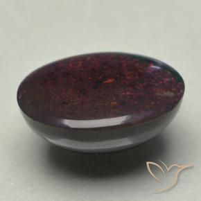 Opala negra multicolorido natural 0,74ct, corte oval, opaco