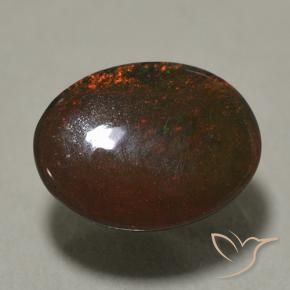 Opala negra multicolorido natural 0,89ct, corte oval, opaco