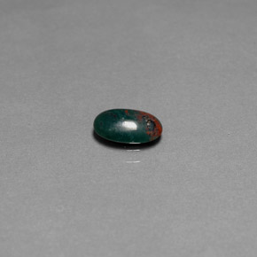 Pedra de sangue verde natural 0,82ct, corte oval, opaco