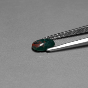Pedra de sangue verde natural 0,82ct, corte oval, opaco