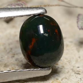 Pedra de sangue verde natural 0,53ct, corte oval, opaco