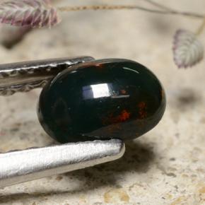 Pedra de sangue verde natural 0,53ct, corte oval, opaco